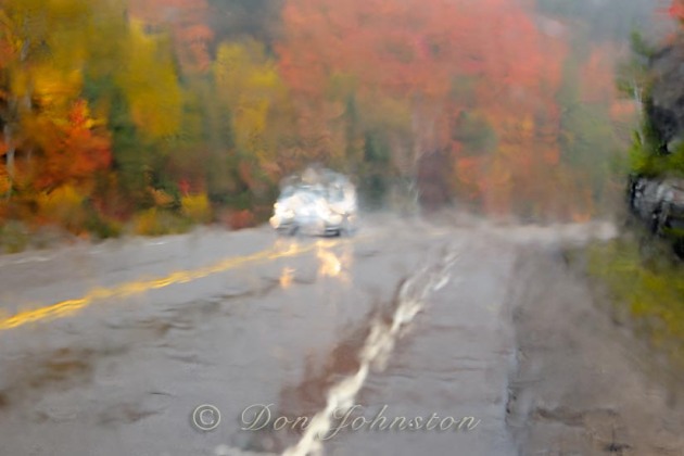 Algonquin's highway 60 seen through a rain-soaked window. 1/15 s @ f11 ISO 800